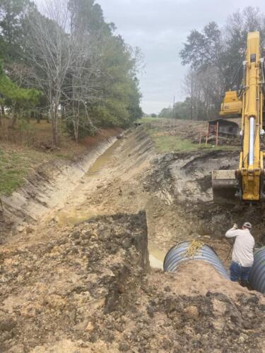 Dual Pipe Installation & Ditch Regrading